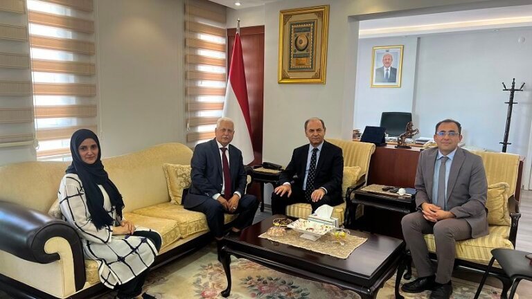 Yemen's Ambassador to Türkiye Mohammed Tareq seated with academic officials during a meeting at the Yemeni embassy in Ankara