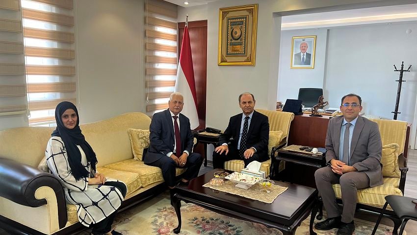 Yemen's Ambassador to Türkiye Mohammed Tareq seated with academic officials during a meeting at the Yemeni embassy in Ankara
