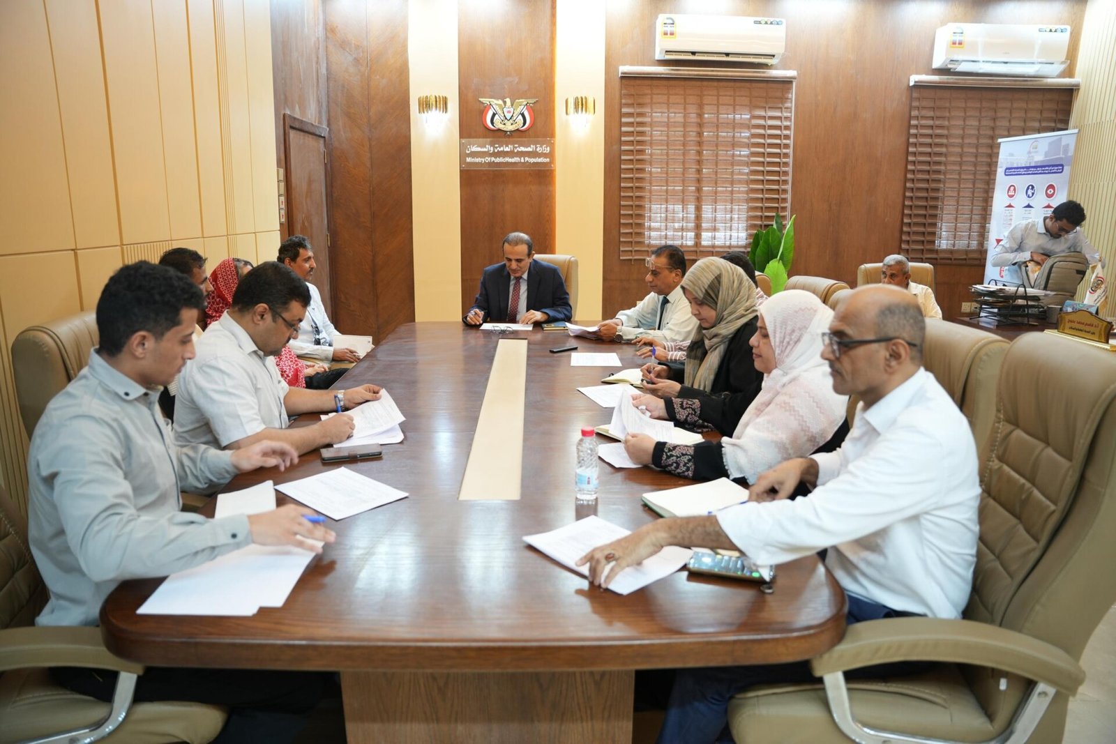 Yemen health ministry officials seated around a meeting table in Aden during talks on expanding medical services