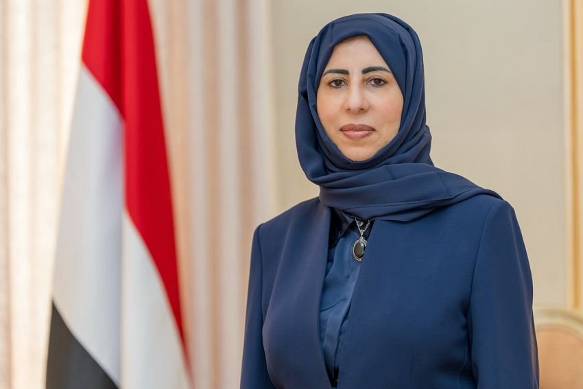 Yemeni Foreign Minister Dr. Afrah al-Zouba, the first woman to hold the post, pictured against the colours of the Yemeni flag