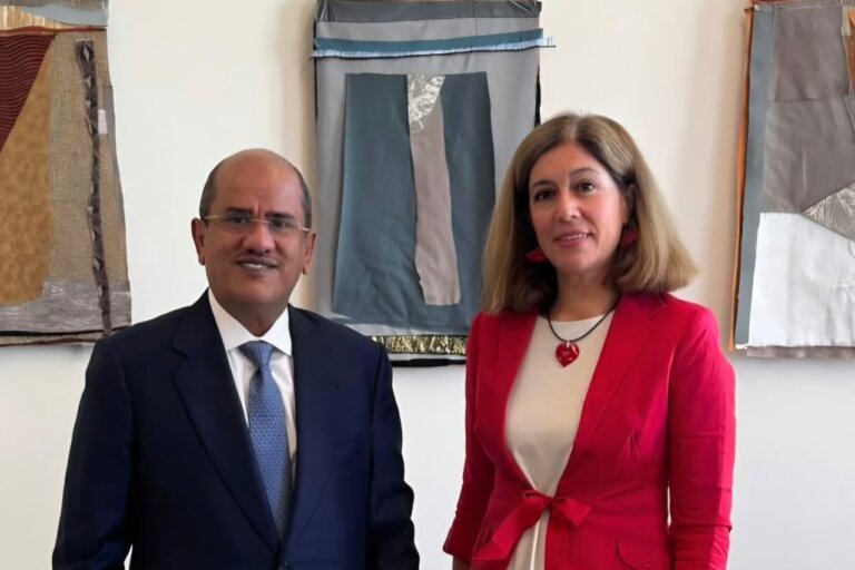 Yemen's ambassador to Spain Aws al-Awd stands with Spanish foreign ministry official Maria Luisa Benitez-Donoso after their meeting in Madrid.