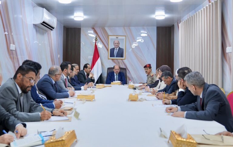 Yemeni ministers seated around a conference table in Aden during a Council of Ministers session chaired by Prime Minister Shaya Mohsen al-Zindani