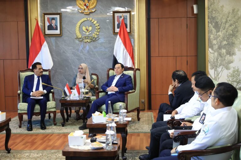 Yemen's ambassador to Indonesia meets officials at a bilateral meeting in Jakarta with Yemeni and Indonesian flags