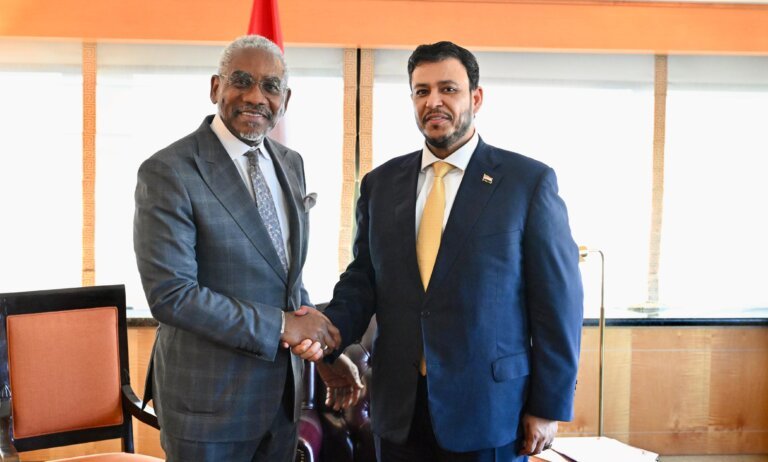 Yemeni Presidential Leadership Council member Abdullah al-Alimi Bawazir shaking hands with US Representative Gregory Meeks