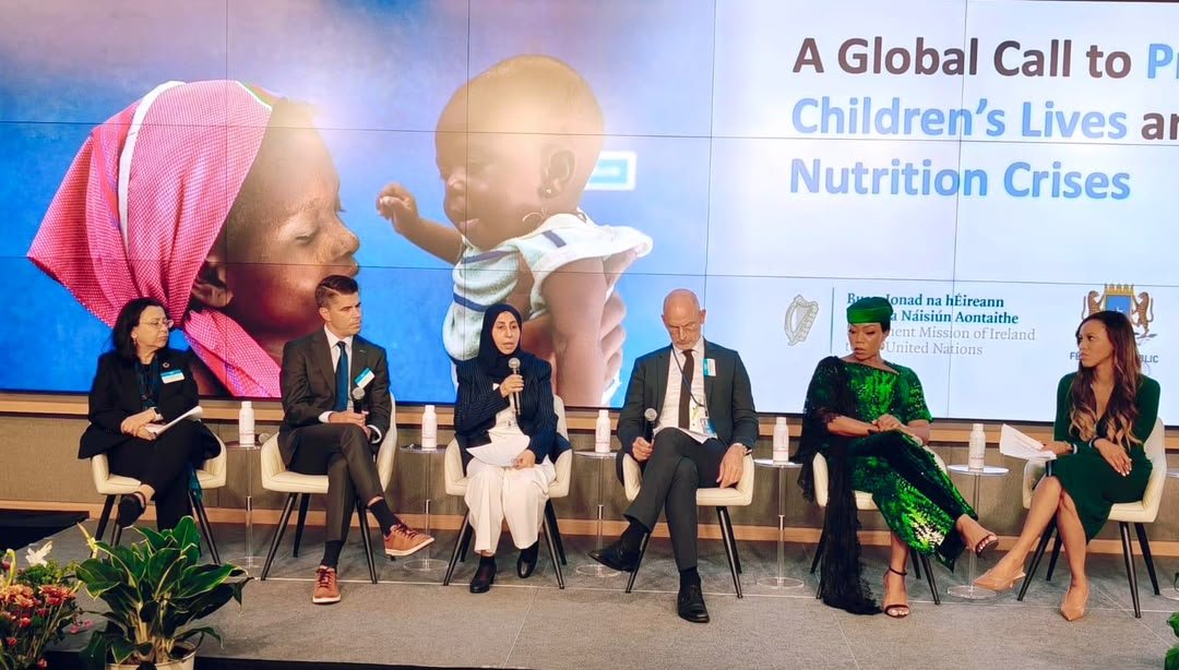 Panellists seated on stage at a UNICEF high-level event on protecting children's lives and preventing nutrition crises, held during the UN General Assembly in New York.