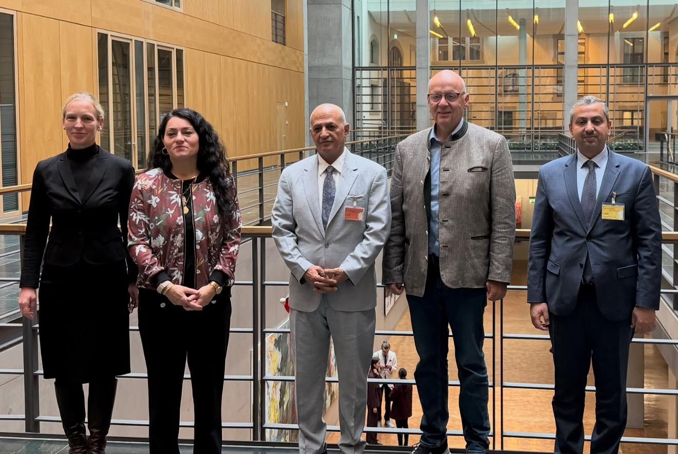Yemeni water and environment minister Tawfiq al-Sharjabi with German parliamentarians and officials at a meeting in Berlin
