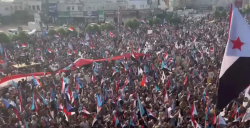 Crowds fill a square in Aden waving South Yemen flags at a Southern Transitional Council rally marking the southern army anniversary