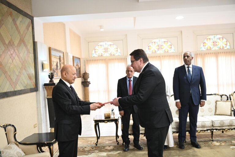 President Rashad al-Alimi receives a credentials folder from a newly appointed ambassador at a ceremony in Riyadh