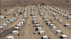 Rows of white tents at a camp sheltering families displaced by fighting in Yemen