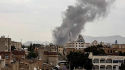 Smoke rises over rooftops in Sanaa after airstrikes on the Houthi-held Yemeni capital