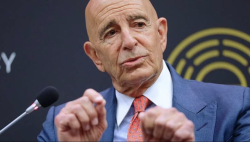 Tom Barrack speaking at a podium microphone during the Global Security Forum in Doha