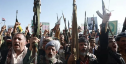Armed Houthi supporters at a rally in Yemen